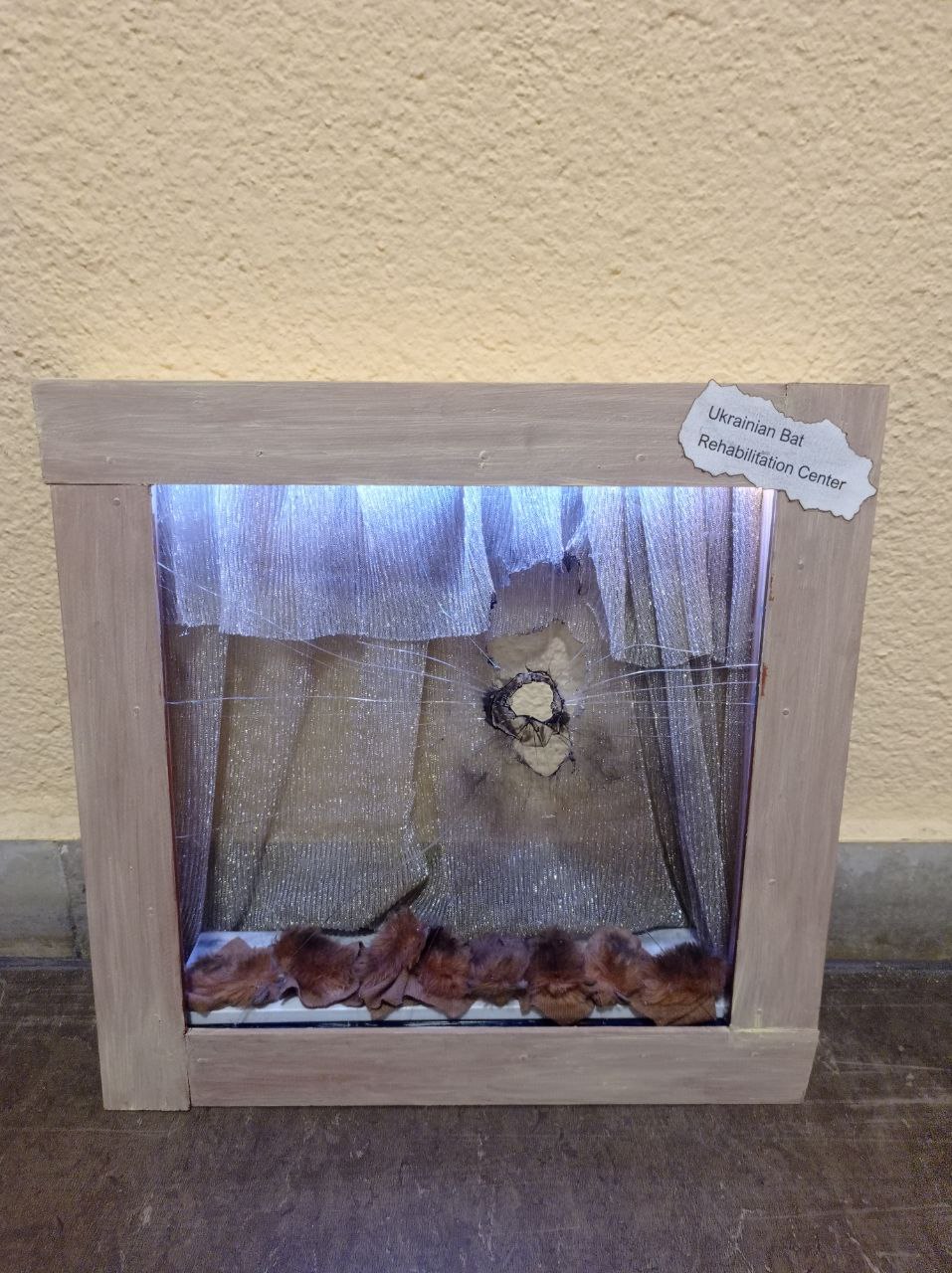 Artwork about bats trapped in window trap